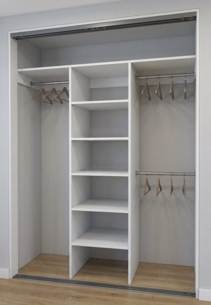 built in wardrobe with a shelves